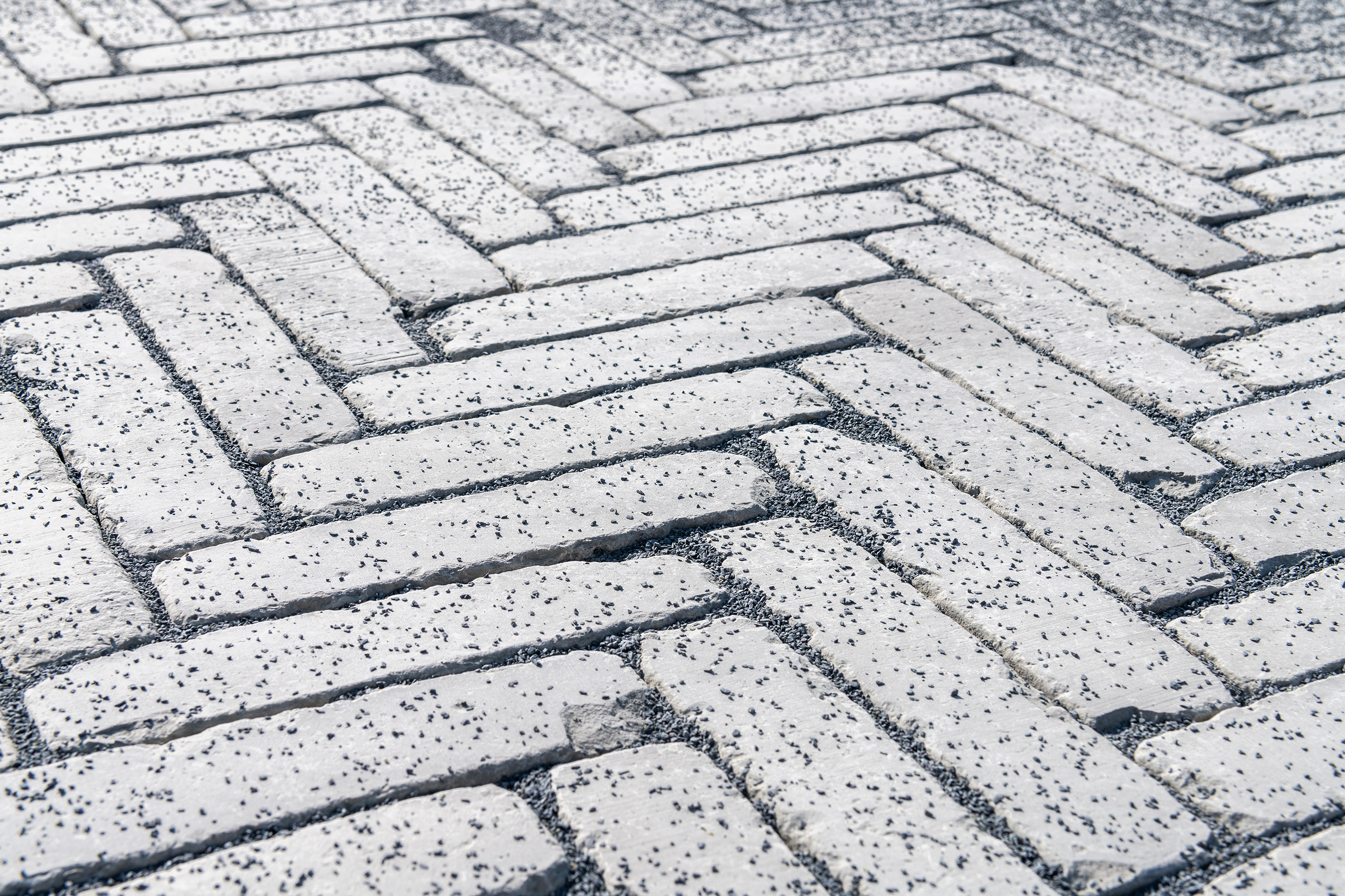 WATER-PERMEABLE PAVING