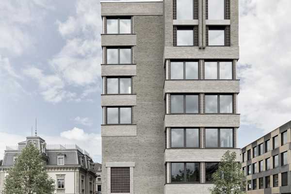 Seven-story modern structure in facing brick linea 7035 and 7036 complementing historical craftsmanship