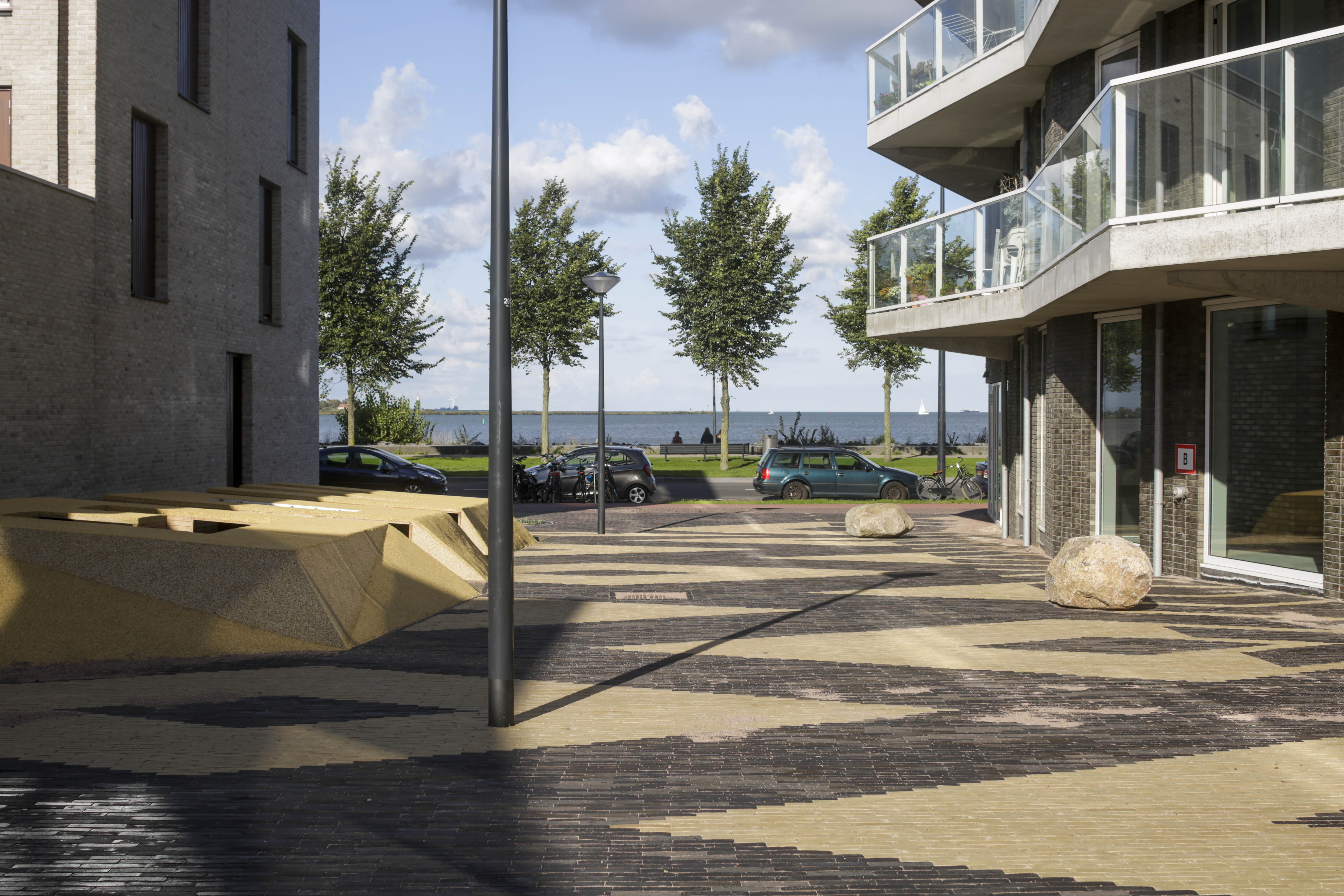 Contrasting pattern of SeptimA clay pavers bring colour to Kieke-Boe district square in Amsterdam